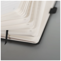Notizbuch Kompagnon Klassik | A6, kariert, Gummizugverschluss, schwarz